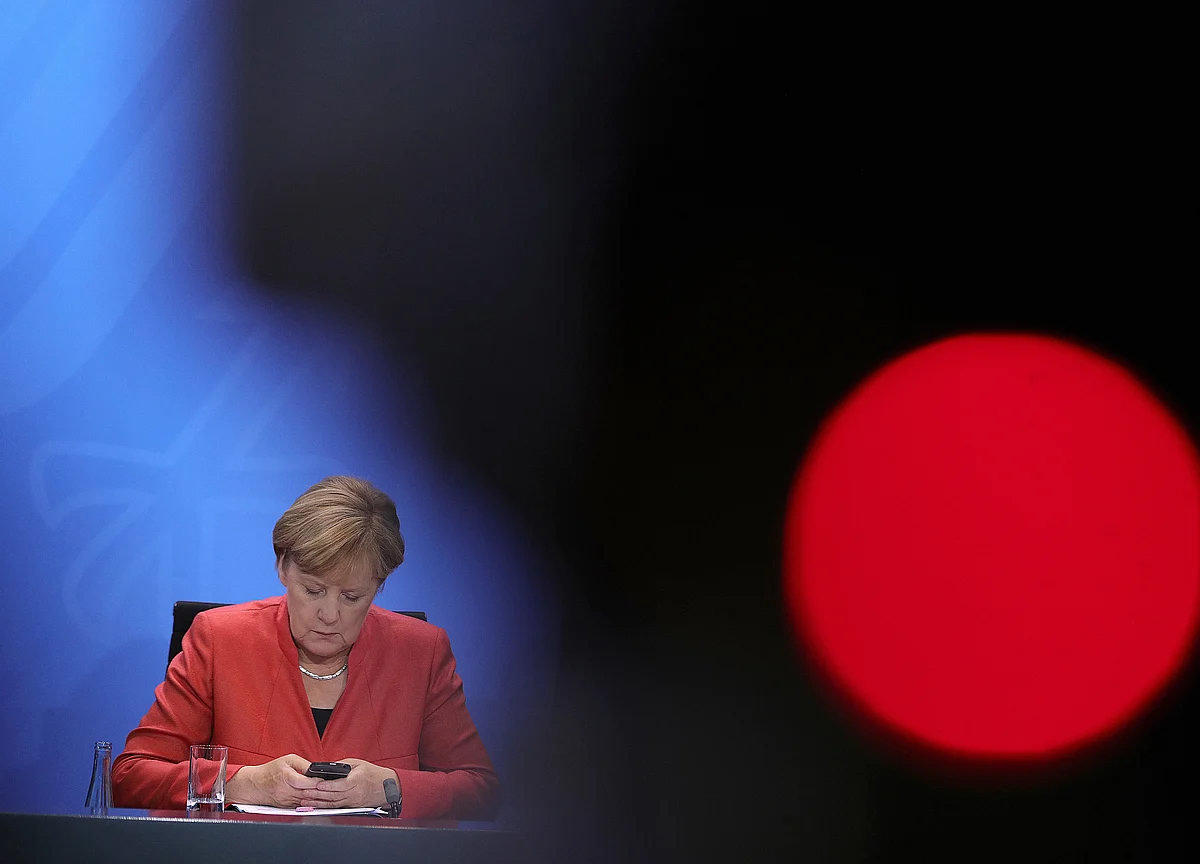 Merkel Says Diesel Needed as Bridge Technology to Electric Cars