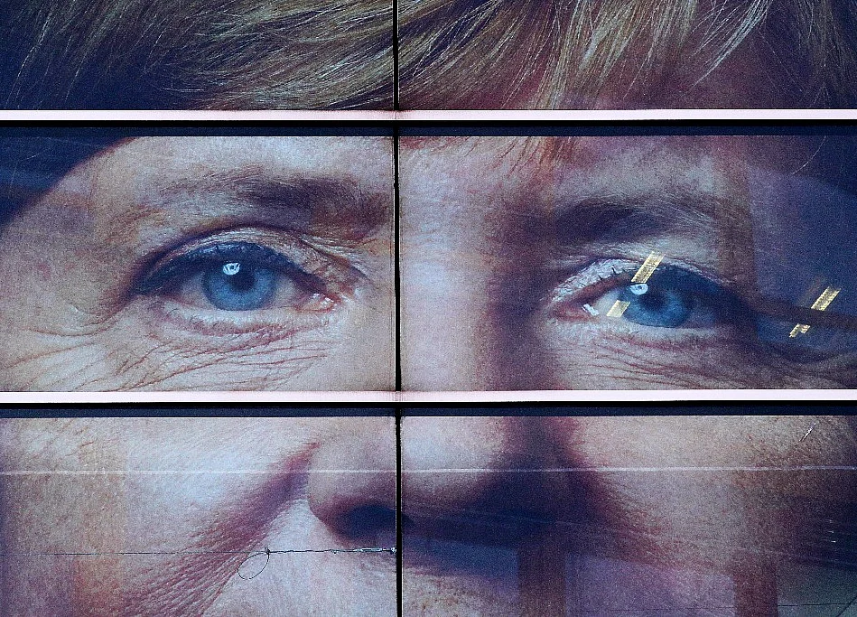 Merkel Gets a Break as Partner Stays in Coalition, For Now