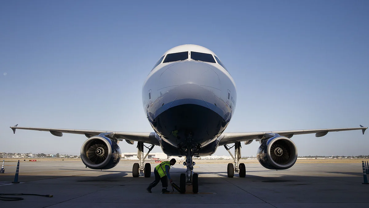A JetBlue Airways Corp. Airbus Group SE A320 aircraft taxis to the gate. (Photographer: Patrick T. Fallon/Bloomberg)