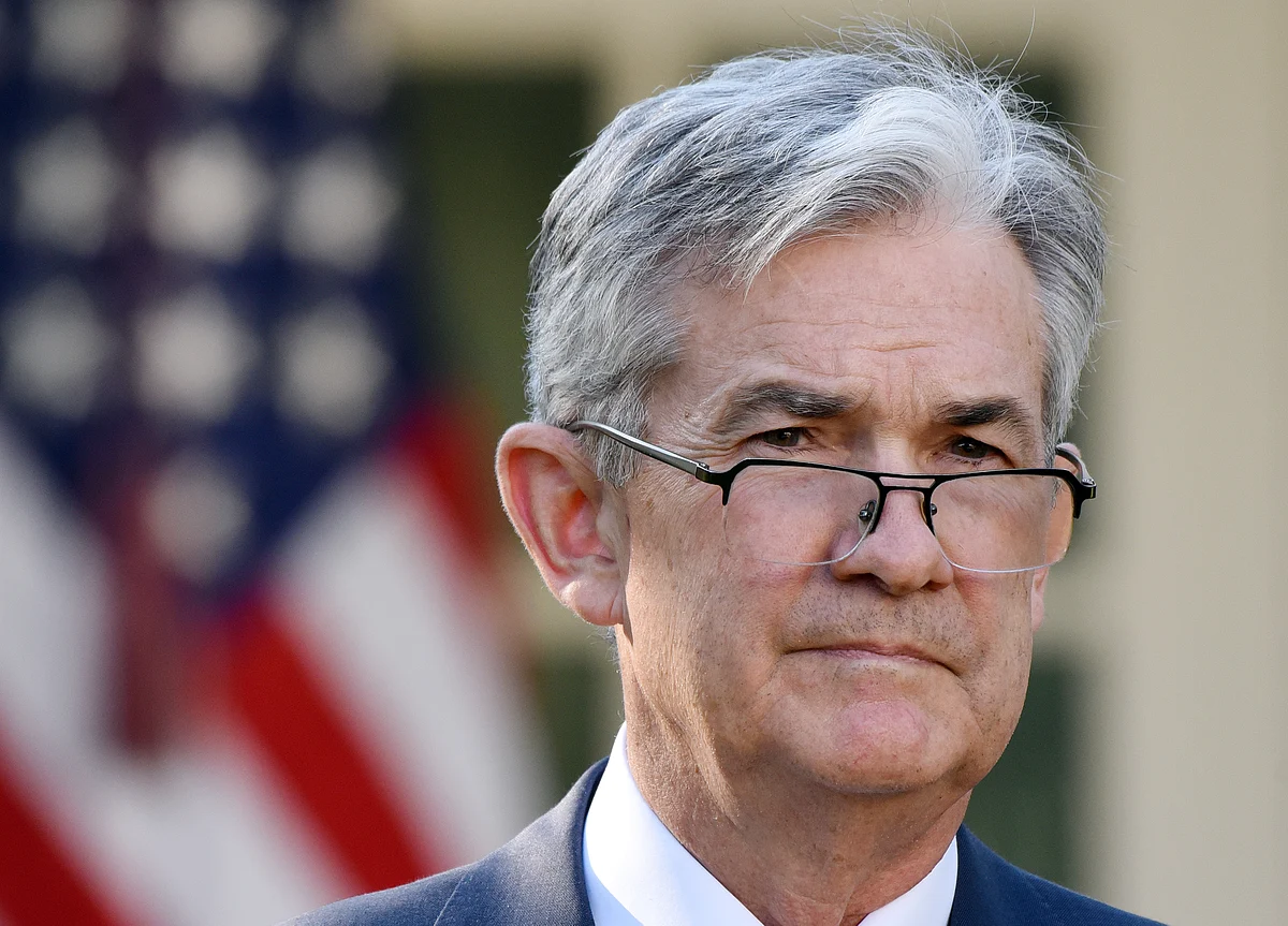 Powell Says Solid Economy Faces Headwinds as Fed Mulls Rates