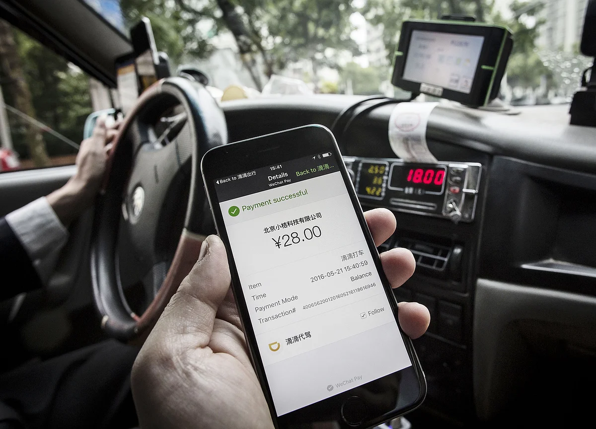 China's Didi Cashes Up to Go Global in Next Stage of Uber Battle