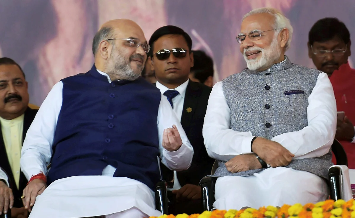 Prime Minister Narendra Modi and BJP President Amit Shah during the swearing-in ceremony of the new Gujarat government in Gandhinagar on December 27, 2017, (Photographer: Santosh Hirlekar/PTI)