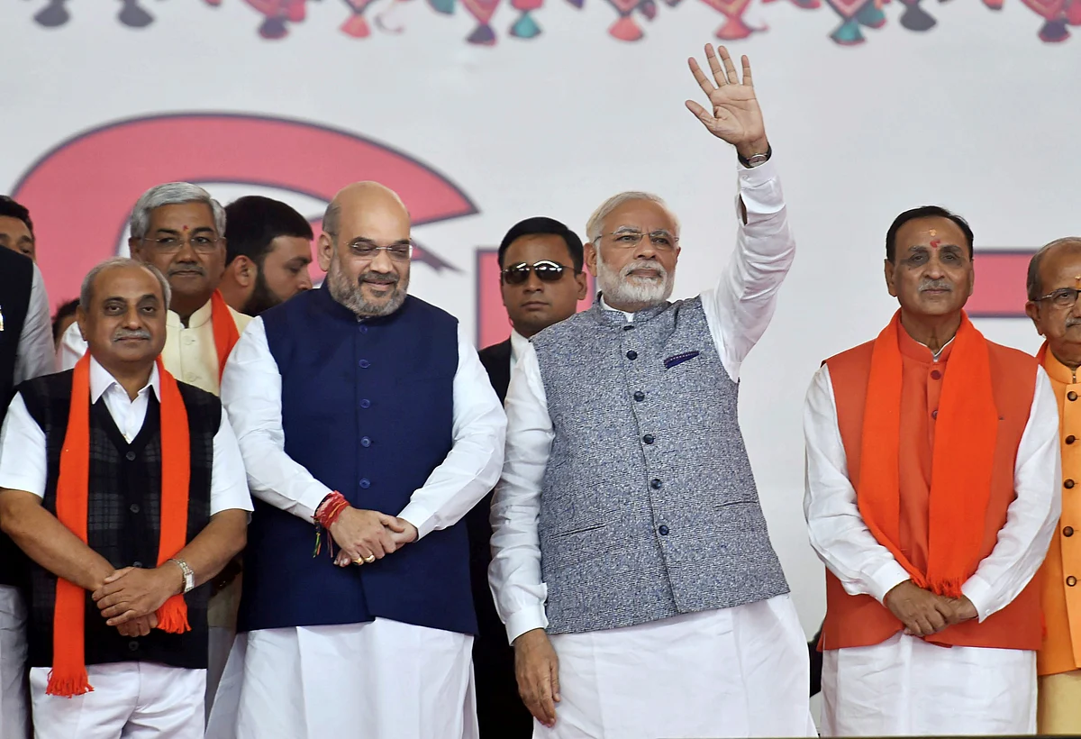 Gujarat Deputy Chief Minister Nitin Patel, BJP President Amit Shah, Prime Minister Narendra Modi, and Gujarat Chief Minister Vijay Rupani at the swearing-in ceremony at Gandhinagar, Gujarat on December 26, 2017. (Photograph: Santosh Hirlekar/PTI)