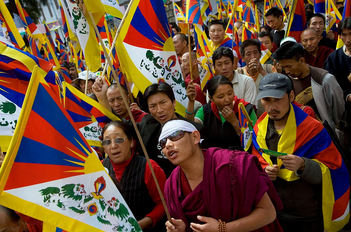 Tibetans march in protest of the Chinese occupation of Tibet, in Dharamsala, India, on March 22, 2008. (Photographer: Adam Ferguson/Bloomberg News)