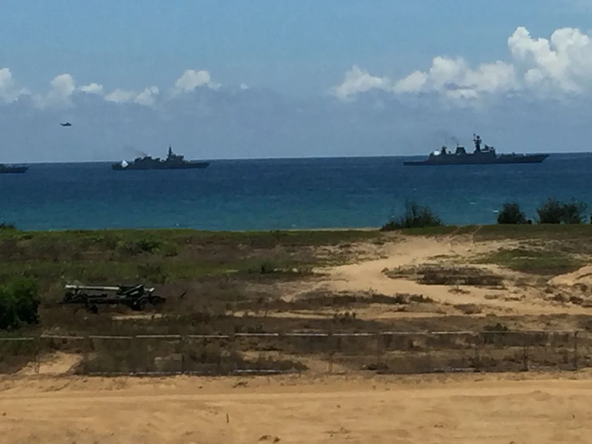 Indian Naval warships in formation as part of the live demonstration at the 10th Defence Expo. (Source: PTI)