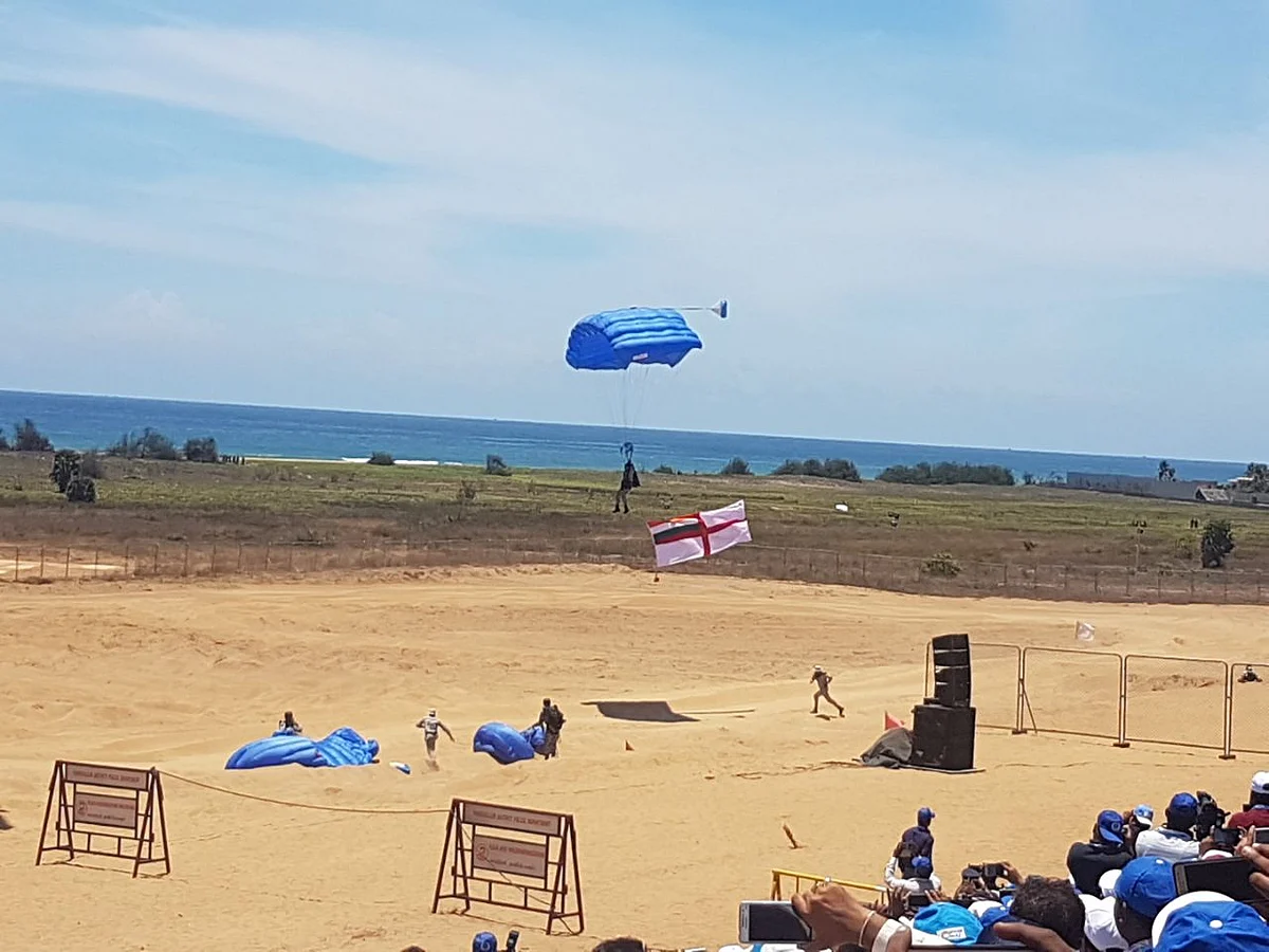 Marcos para-trooped from 10,000 feet as part of the Live demonstration at the 10th Defence Expo. (Source: PTI)