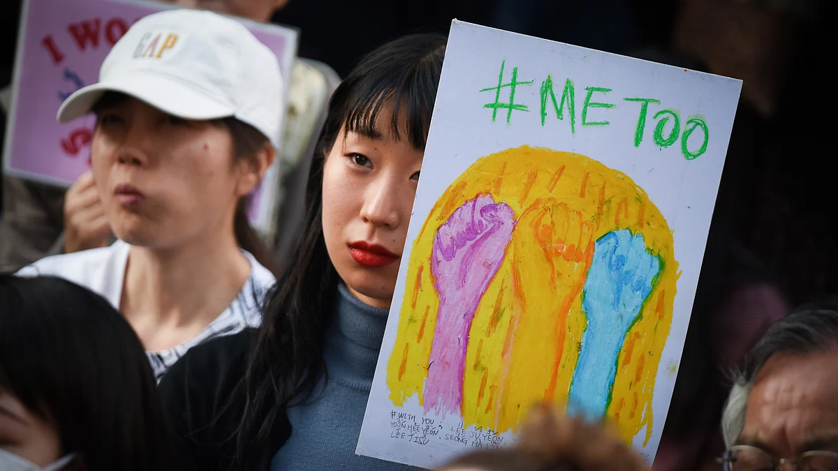 A demonstrator holds a sign reading “#Me Too” during a rally against sexual harassment in Shinjuku, Tokyo (Photographer: Noriko Hayashi/Bloomberg) 