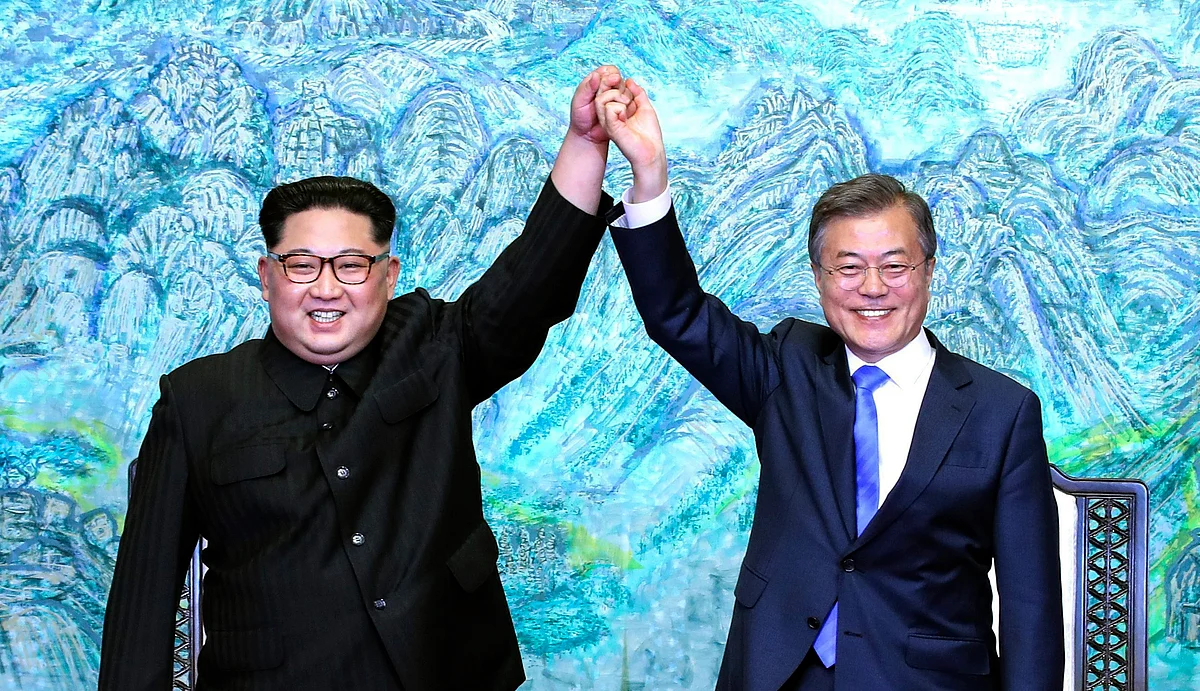 Kim Jong Un, North Korea’s leader, with Moon Jae-in, South Korea’s president, at the inter-Korean summit outside the Peace House in the village of Panmunjom in the Demilitarized Zone (DMZ) in Paju, South Korea, on April 27, 2018. (Photograph: AP/PTI)