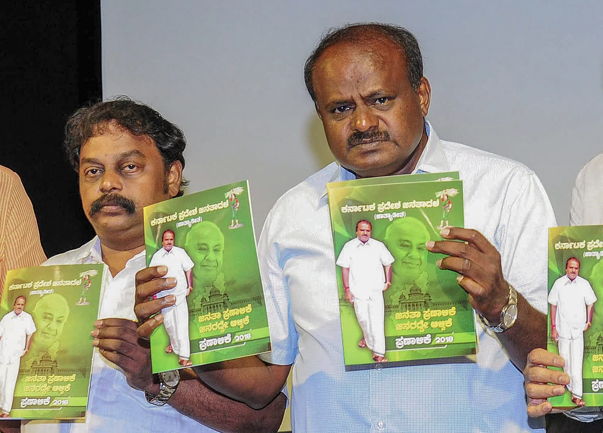Janata Dal (Secular) President HD Kumaraswamy with party leaders release a party manifesto ahead of Karnataka Assembly Elections. (Source: PTI)