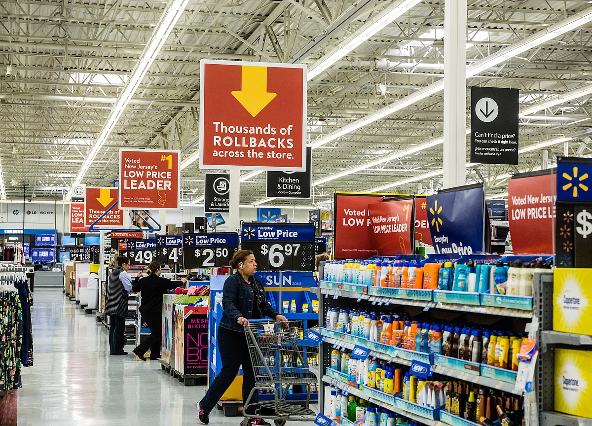 U.S. Consumer Spending Cools While Inflation Tops Fed Goal