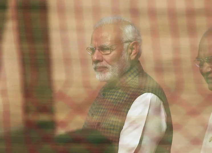 Modi Rushes to Insure Half a Billion Indians Before Election