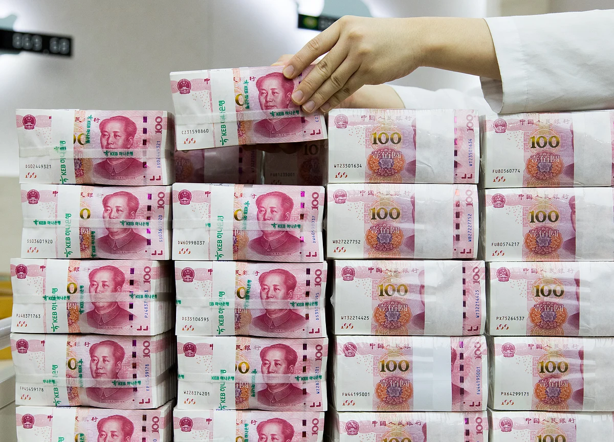 China Set for Record Defaults, and Downgrades Tip More Pain