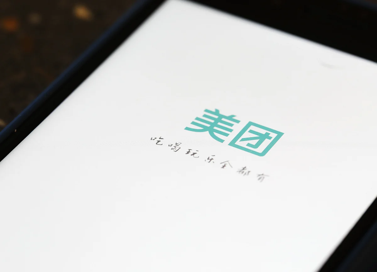 Meituan Plunges as Losses Balloon in Food Fight With Alibaba