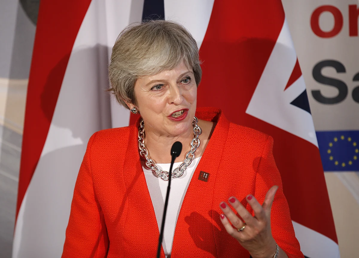 May Retaliates After Bruising EU Summit as Pound Plunges