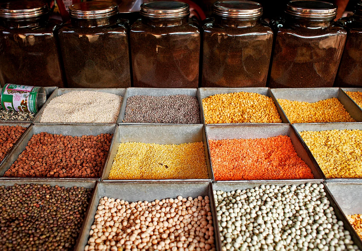 Pulses (lentils and beans) are displayed for sale at a market in Mumbai. (Photographer: Adeel Halim/Bloomberg). 