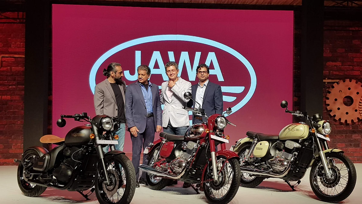 The three Jawa Motorcycles on stage at the launch with M&M Chairman Anand Mahindra (second from left). (Source: BloombergQuint)