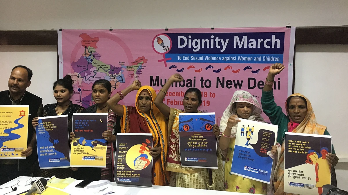 Bhanwari Devi and along with sexual violence survivors with the convenor of Rashtriya Garima Abhiyan. (Photograph: The Quint)