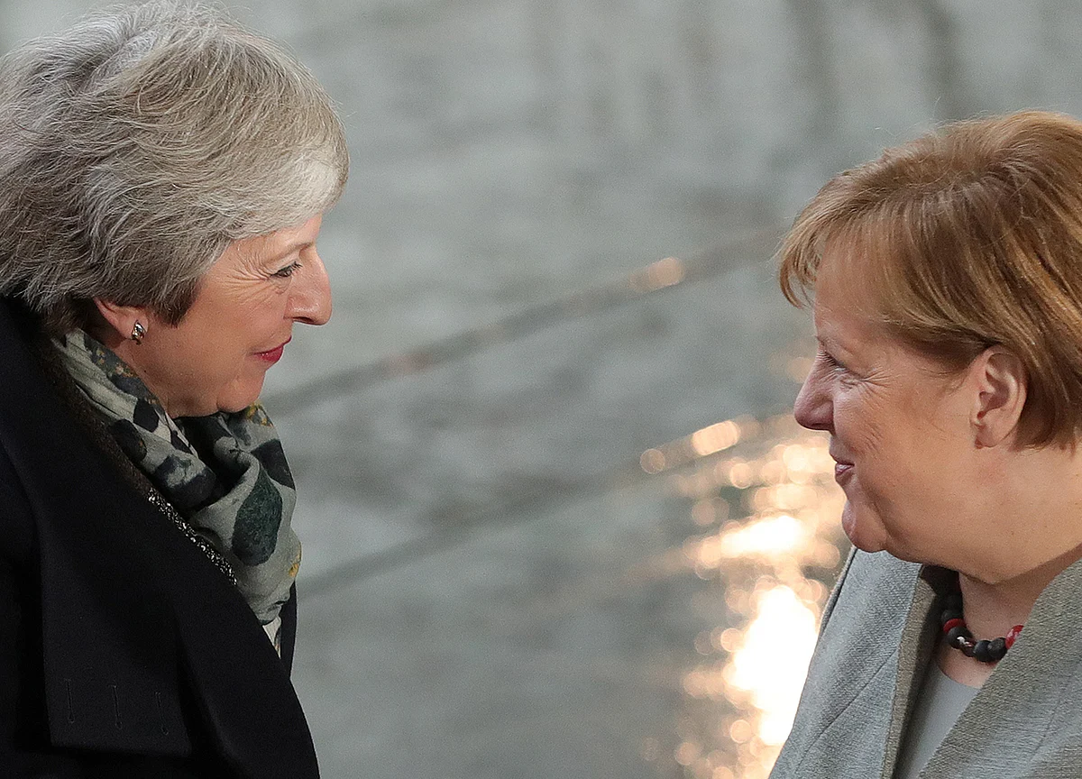 May Said to Warn Merkel, Macron Their Brexit Deal Is Almost Dead