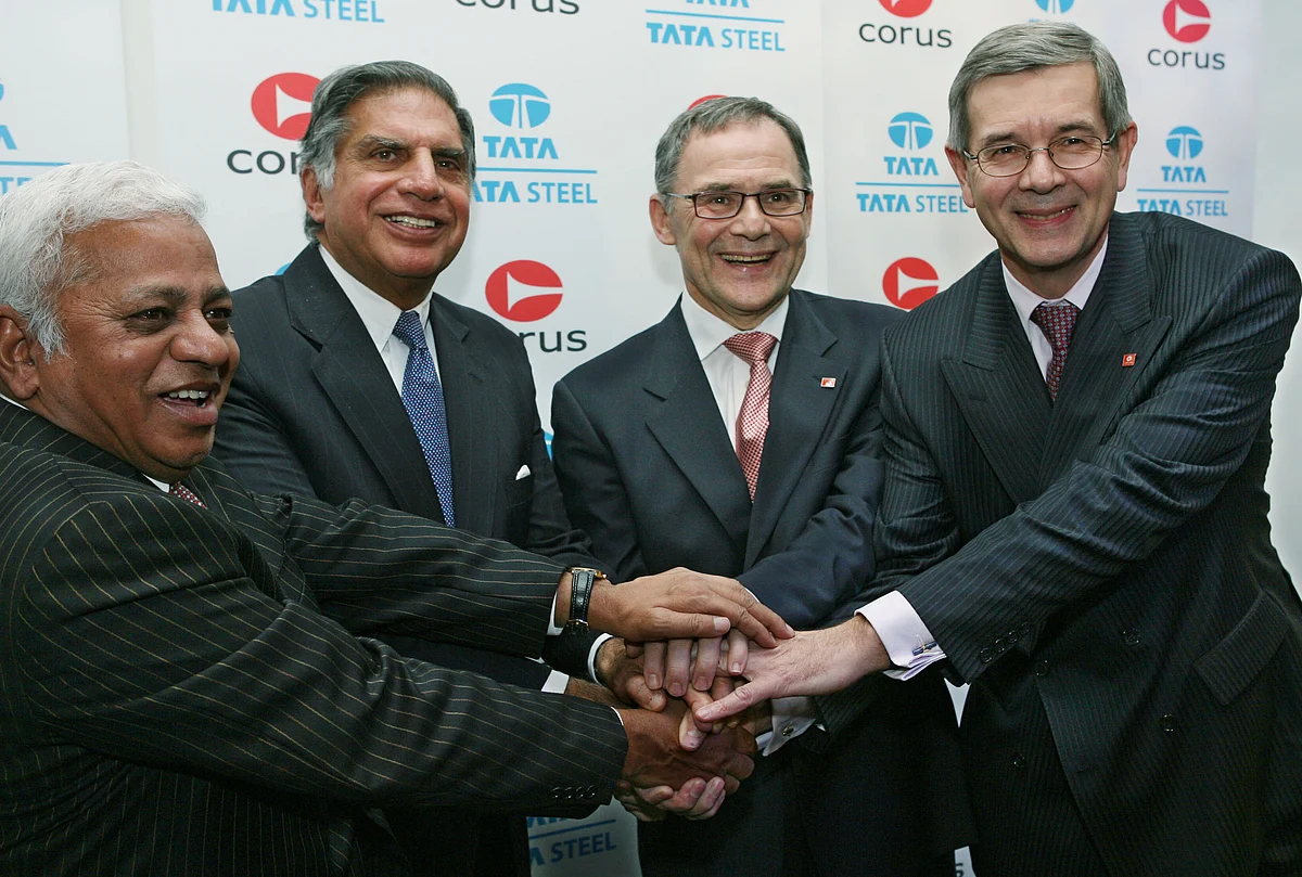 Top executives of Tata Steel and Corus Group, after a news conference, in London, on Oct. 20, 2006. (Photographer: Suzanne Plunkett/Bloomberg News)