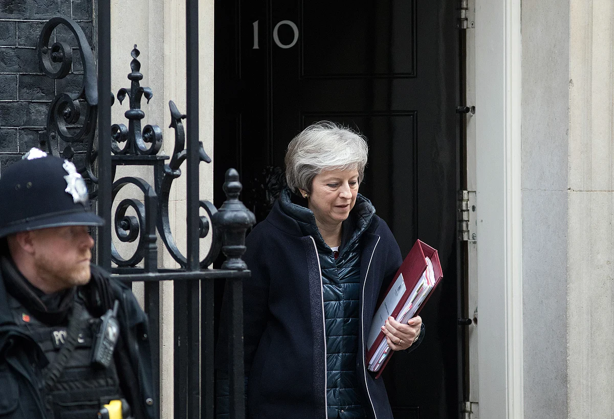 May Returns to Brexit Front Line After Surviving Tory Ambush