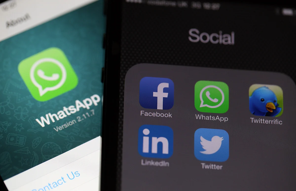 Icons for social media applications including the WhatsAp. (Photographer: Chris Ratcliffe/Bloomberg)