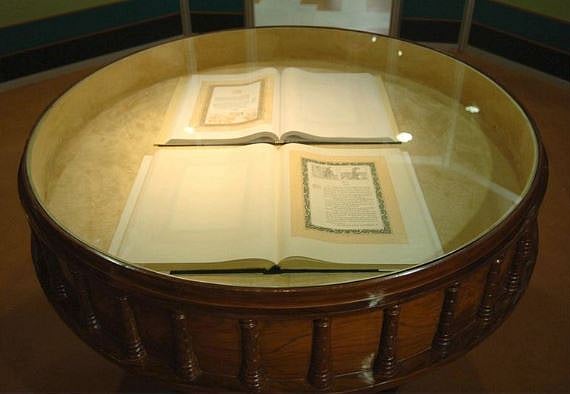 The original document was signed in two languages: English and Hindi both of which are kept in a helium filed case in the library of the Parliament of India.