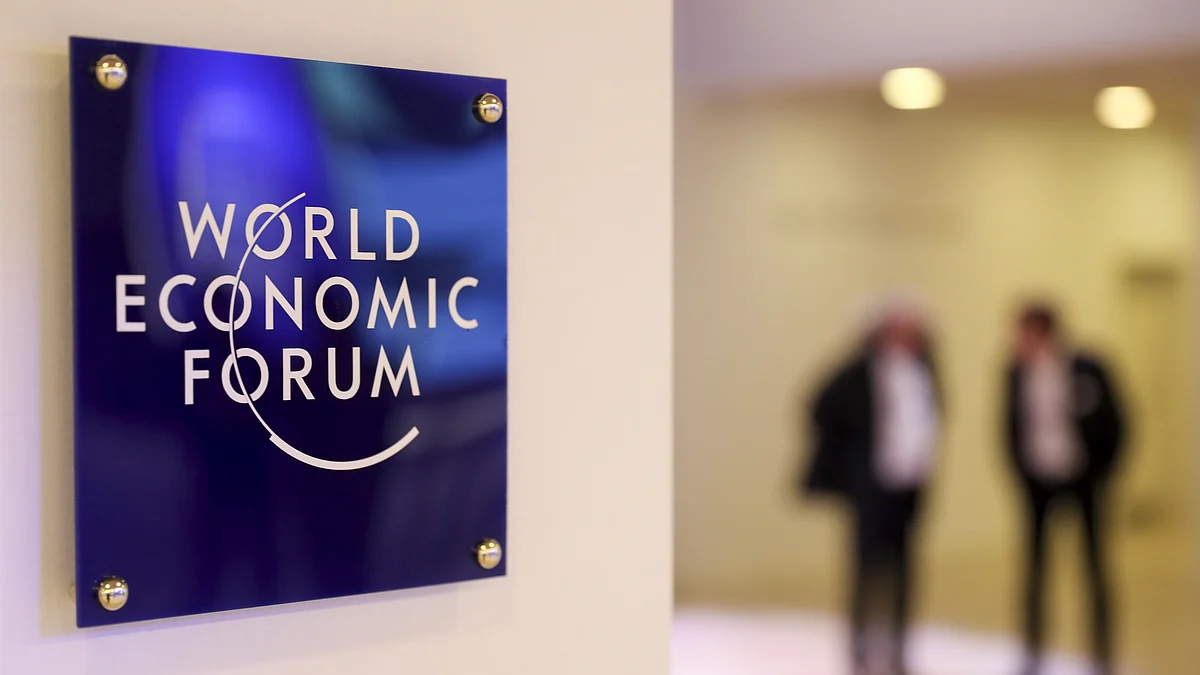 A World Economic Forum sign hangs inside the Congress Center ahead of the World Economic Forum in Davos, Switzerland. (Photographer: Simon Dawson/Bloomberg)