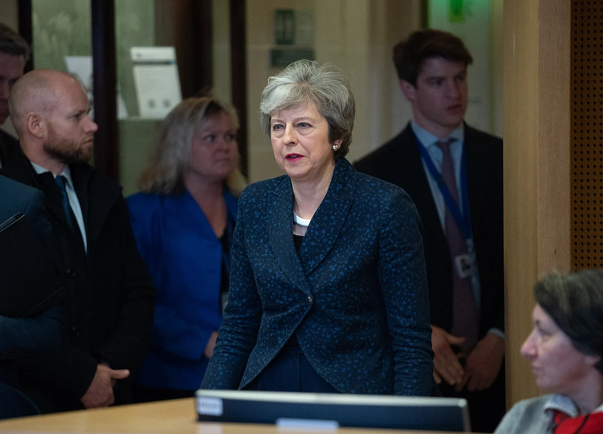 U.K.'s Theresa May to Consider Delay to Brexit Date