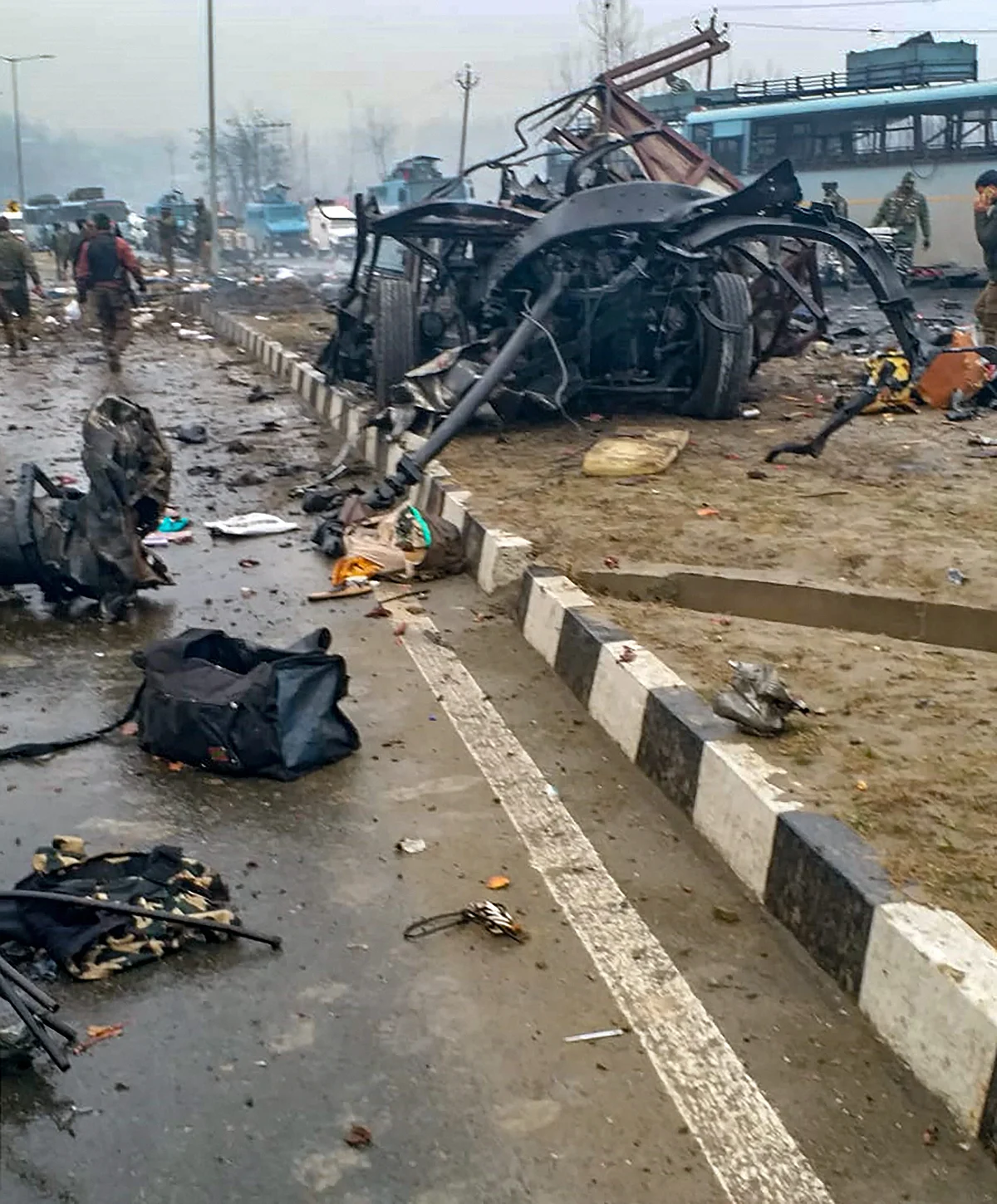 A scene of the spot after militants attacked a CRPF convoy in Goripora area of Awantipora town in Pulwama district. (PTI Photo)