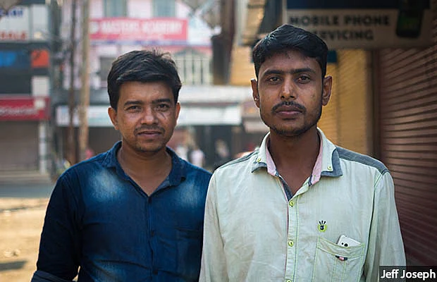 Feroz Shaikh (left), a labour contractor, moved to Kerala from Bengal 19 years ago. Factory owners asked for 15-20 workers per unit before demonetisation, he says. Now, they ask for five. “There is no work.” Raju (right), a mason’s helper, also from Bengal, shares a room with 10 others. His income is down by a third since demonetisation and he finds work two days a week, down from five. There is no money to send home.