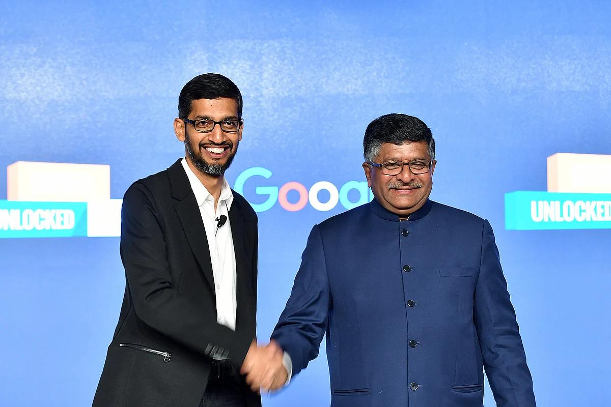 Google CEO Sundar Pichai with with India’s Law and IT Minister Ravi Shankar Prasad, in New Delhi. (Photographer: Anindito Mukherjee/Bloomberg)