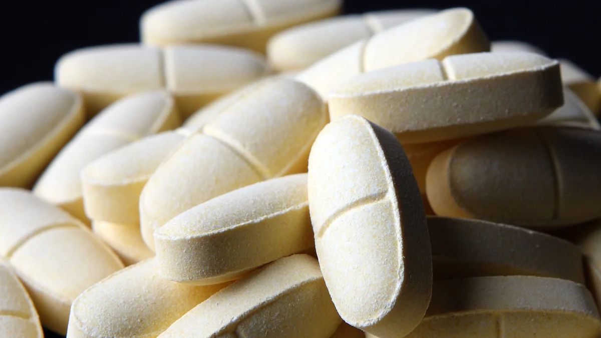 Medicine tablets at a manufacturing facility. (Photographer: Tomohiro Ohsumi/Bloomberg)