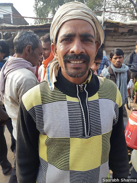 Ram Baran, a daily wage labourer, is one of many at the labour hub to express disappointment with the ruling government.