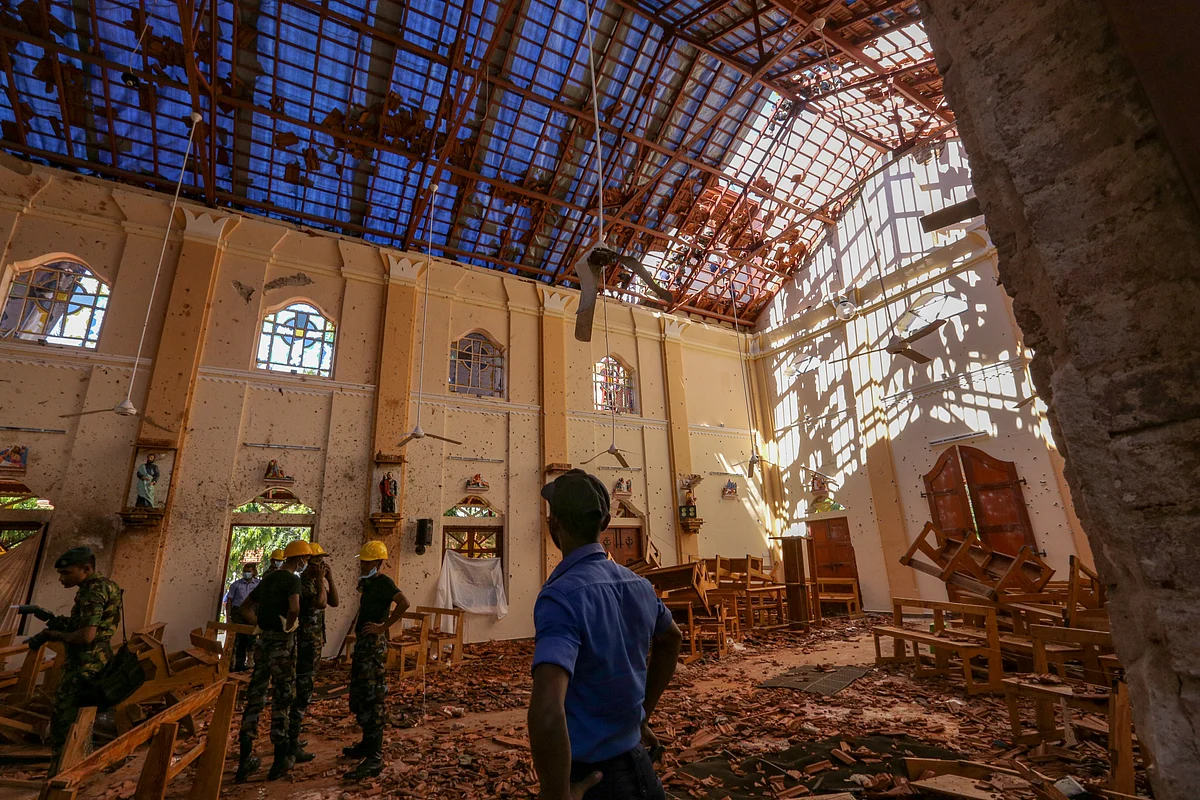 Sri Lankan soldiers inspect the damage inside St. Sebastian’s Church where a bomb blast took place in Negombo, Sri Lanka. (Photographer: Tharaka Basnayaka/Bloomberg)