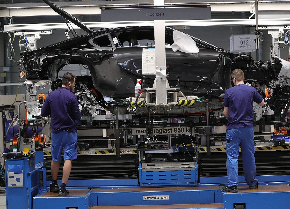 Germany Suffers Double Blow on Factory Slump, Downgrade