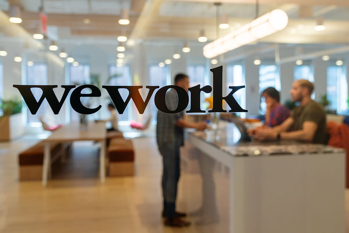 WeWork Makes Small Round of Staff Cuts, Hours After Delaying IPO