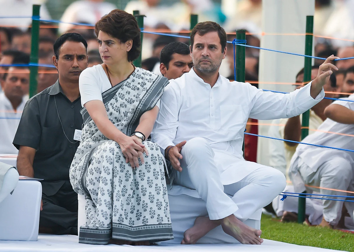 Priyanka Gandhi Vadra and Rahul Gandhi, at Veer Bhumi, in New Delhi, on May 21, 2019. (Photographer: Ravi Choudhary/PTI)