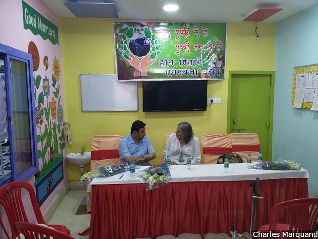 Vaibhav Kapoor (left), Bharatiya Janata Party leader and head of the party’s social media campaign, speaks to your reporter at a primary school in Varanasi. “I don’t fake things,” Kapoor says. “Sometimes, if I don’t want to speak the truth, I can tell you the extended truth. But I don’t lie.”