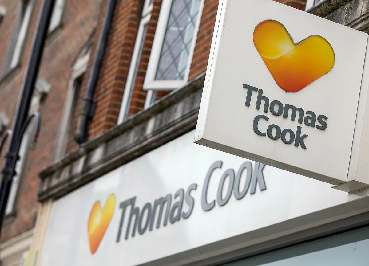 Thomas Cook Shares Slump as Losses Mount