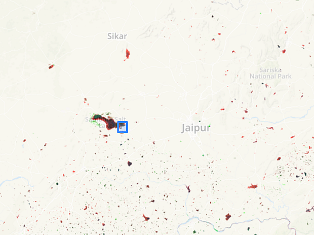 Satellite data on the changes in surface water in and around Jaipur show that several water bodies have either dried out or shrunk in size. In the centre, in blue box, is the 190 sq km of the Sambhar lake. The red indicates water bodies that have reduced in size, while green indicates an increase in the amount of water. Black indicates that the water bodies are the same size. Source: <a href="https://noah-water.appspot.com/">NOAH</a>, an application that shows changes in rainfall and surface water using satellite data.