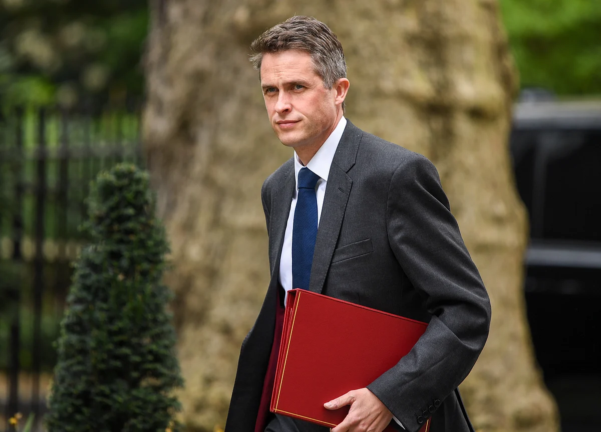 May Fires Defense Secretary Williamson Over Huawei Leak