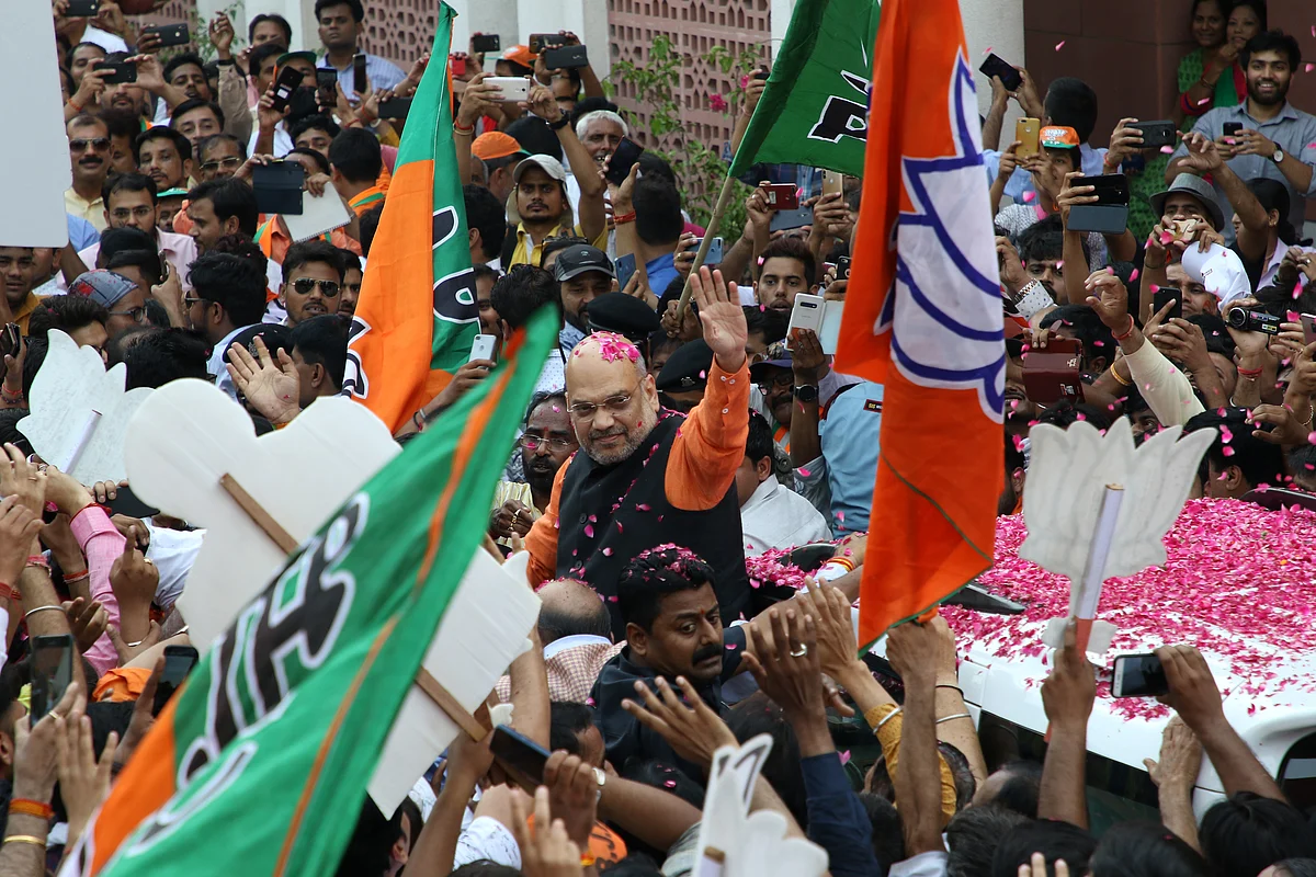 Amit Shah celebrates during an event at the party’s headquarters in New Delhi. (Photographer: T. Narayan/Bloomberg)