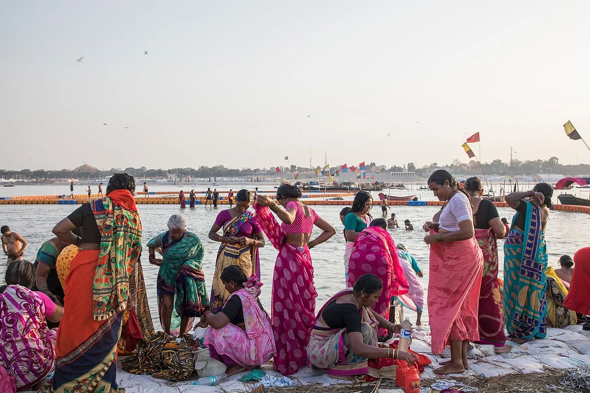 In Prayagraj, pilgrims visit the Triveni Sangam, where the Ganges meets the Yamuna and Saraswati rivers. (Photographer: Anshika Varma for Bloomberg Businessweek)