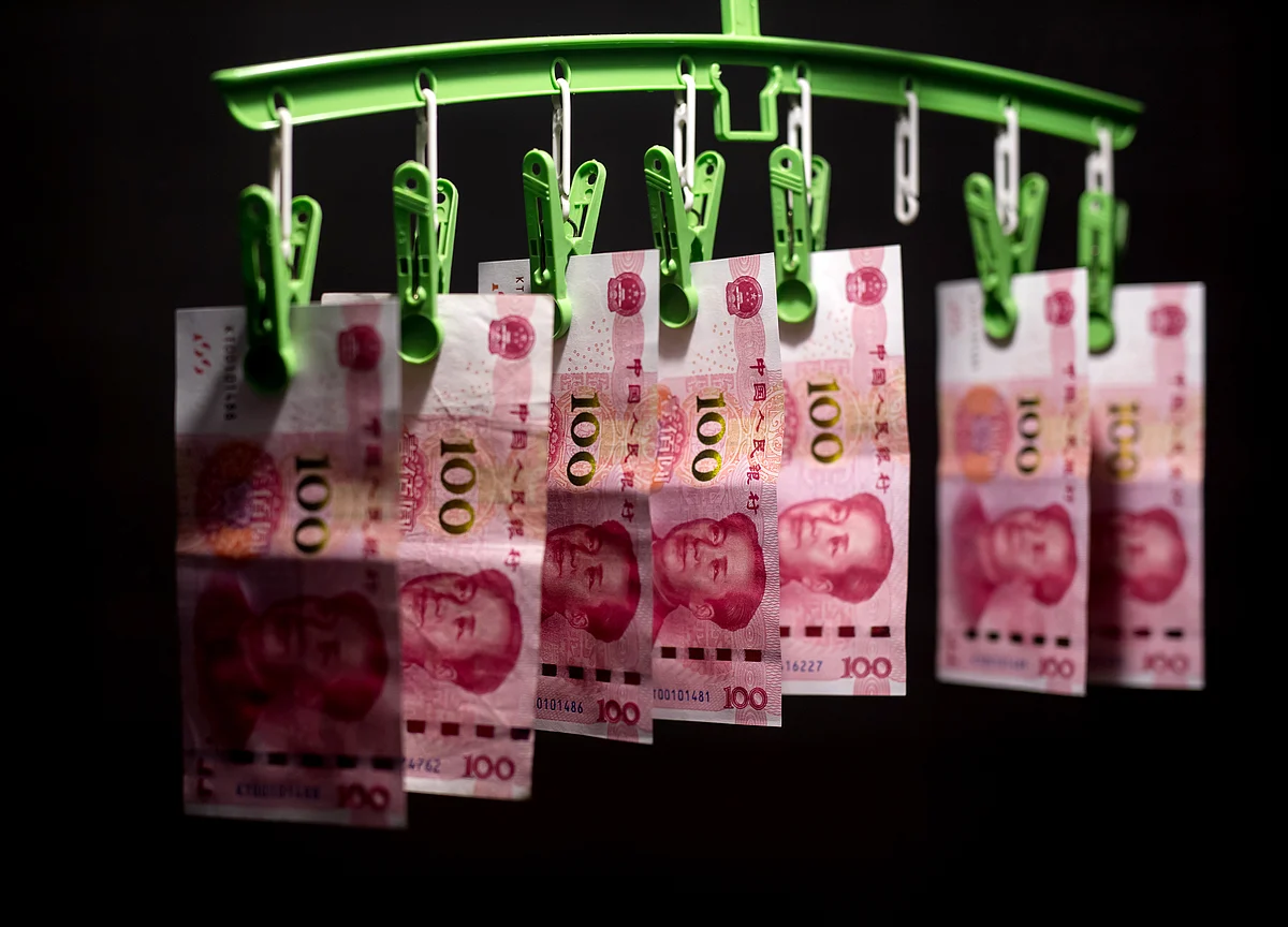 Trade War May Yet Spur China to Sell Treasuries as Yuan Tumbles