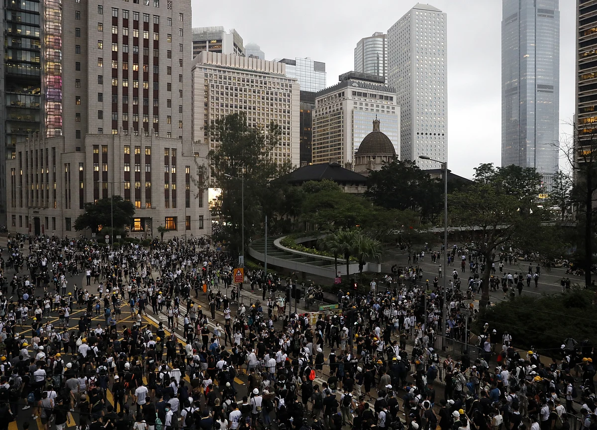 Hong Kong Tempts China’s Ire as Protests Take More Violent Turn