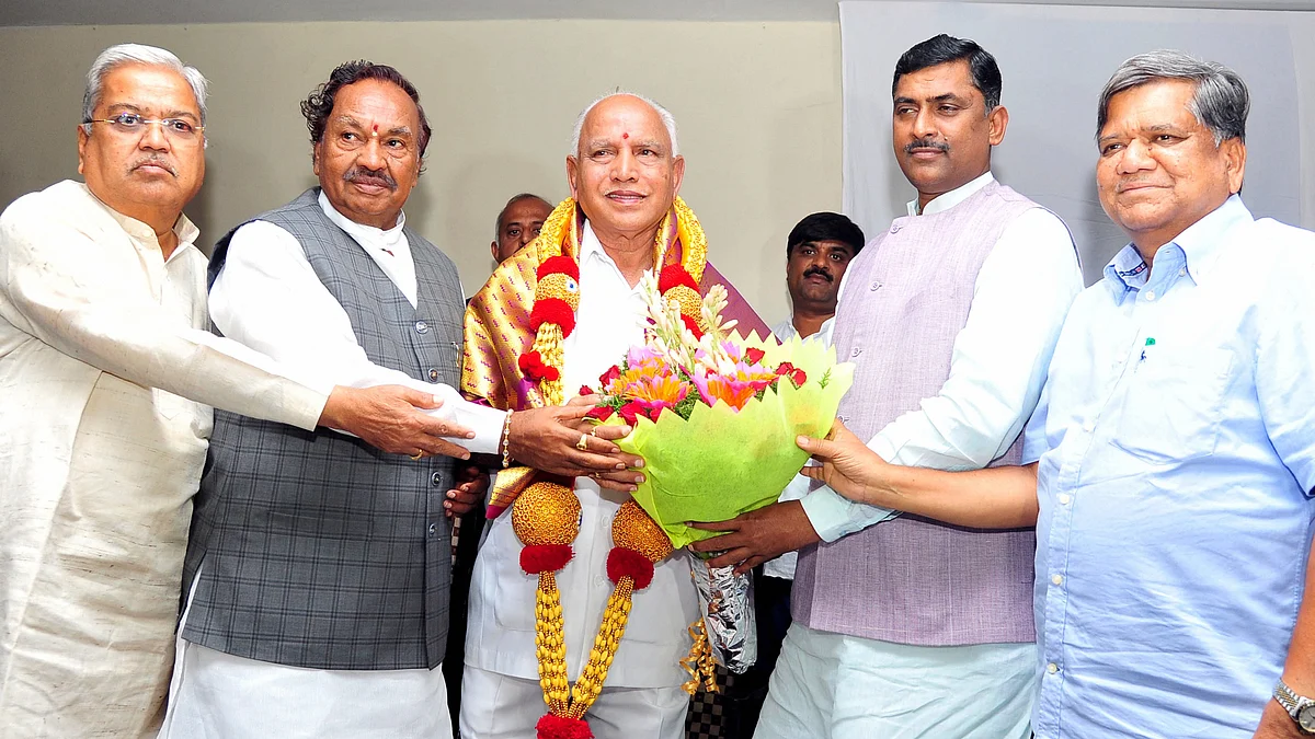 Karnataka Chief Minister BS Yediyurappa being felicitated during a meeting with BJP MLAs in Bengaluru. (Photo: PTI)