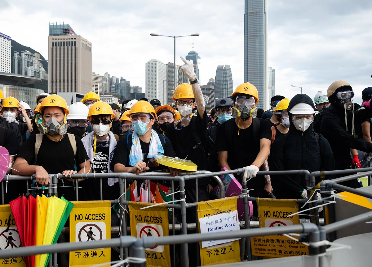 Riot Police Fire Tear Gas to Clear Protesters in Hong Kong