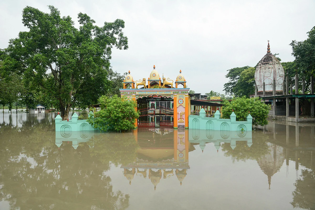 A temple is seen half submerged under flood waters, following heavy monsoon rain, in Kamrup district (Source: PTI)