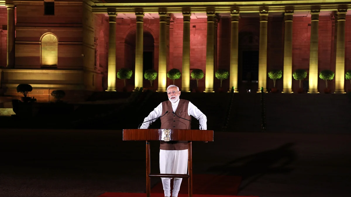 Narendra Modi, India’s prime minister, speaks to members of the media outside the President House in New Delhi, India. (Photographer: Photographer: T. Narayan/Bloomberg) 