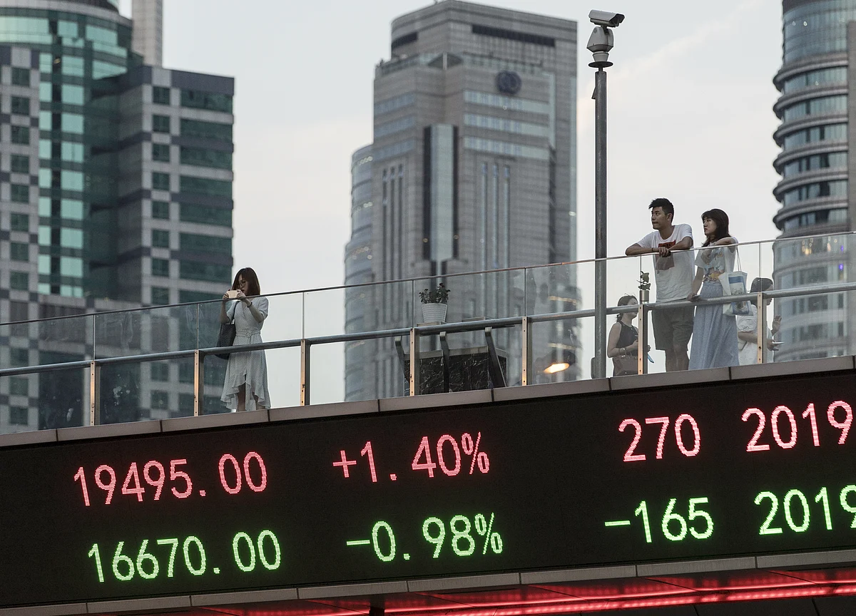 Asia Stock Investors Look Ahead to September Reprieve